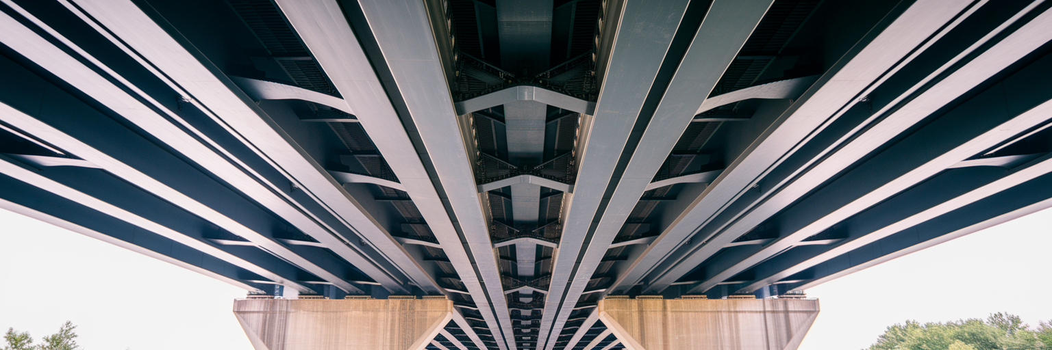 Recovering Lost Wages After A Truck Accident On I 526 1 Complex steel structure under a large bridge.